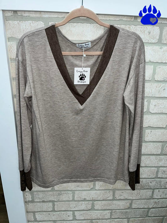 Brown LS top, button accent at wrist